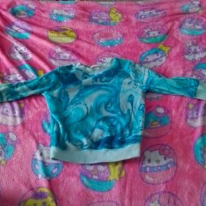 A blue swrild sweater